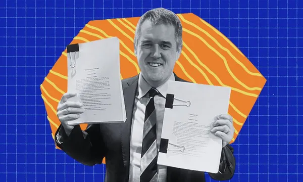 A person in a suit smiles while holding up two stapled documents. The background features a blue grid pattern with an orange shape containing yellow wavy lines.