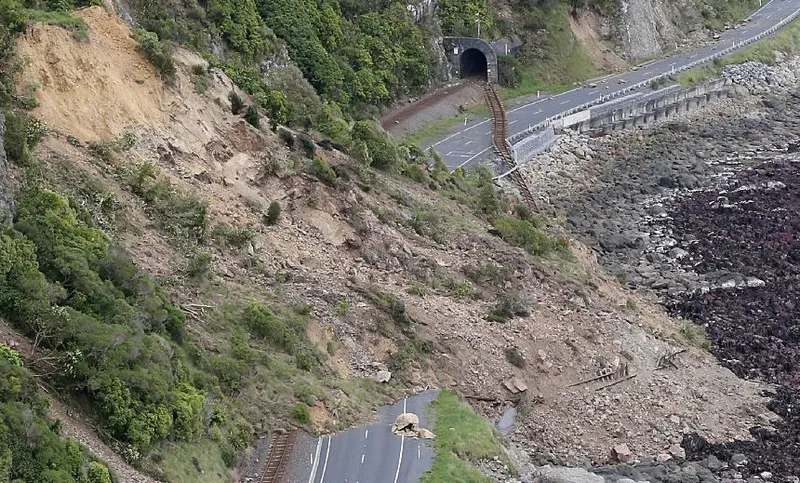 This aerial photo taken and received on November 14, 2016 shows earthquake damage to State Highway One near Ohau Point on the South Island's east coast. A powerful 7.8-magnitude earthquake killed two people and caused massive infrastructure damage in New Zealand, but officials said on November 14 they were optimistic the death toll would not rise further. The jolt, one of the most powerful ever recorded in the quake-prone South Pacific nation, hit just after midnight near the South Island coastal town of Kaikoura. / AFP / POOL / Mark MITCHELL (Photo credit should read MARK MITCHELL/AFP/Getty Images)
