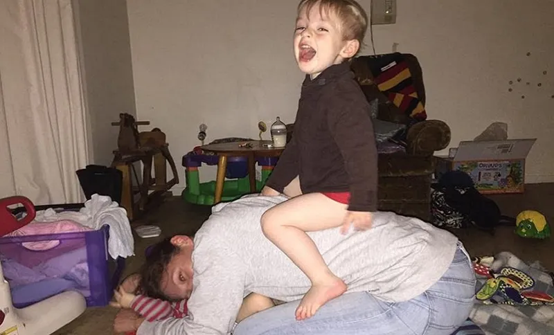 There are three babies in this photo.