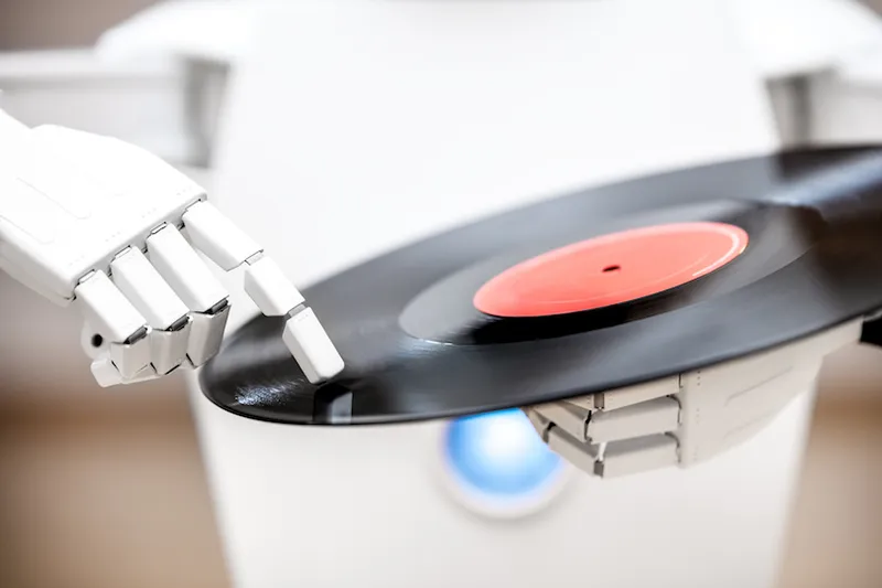 music robot is playing a record while touching with his finger the record. Cocept music streaming or downloading, futuristic music player