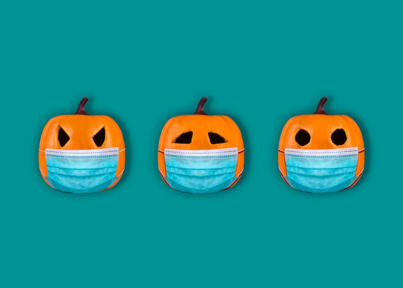 Halloween pumpkins with surgical mask