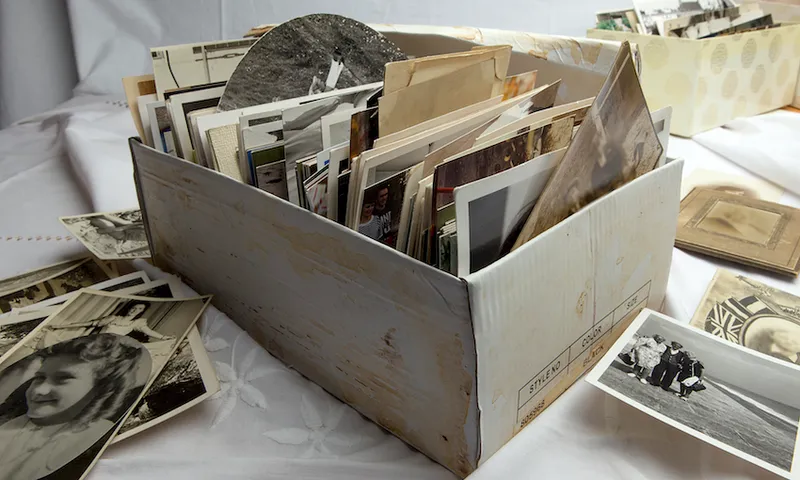 Shoe box of old family photographs
