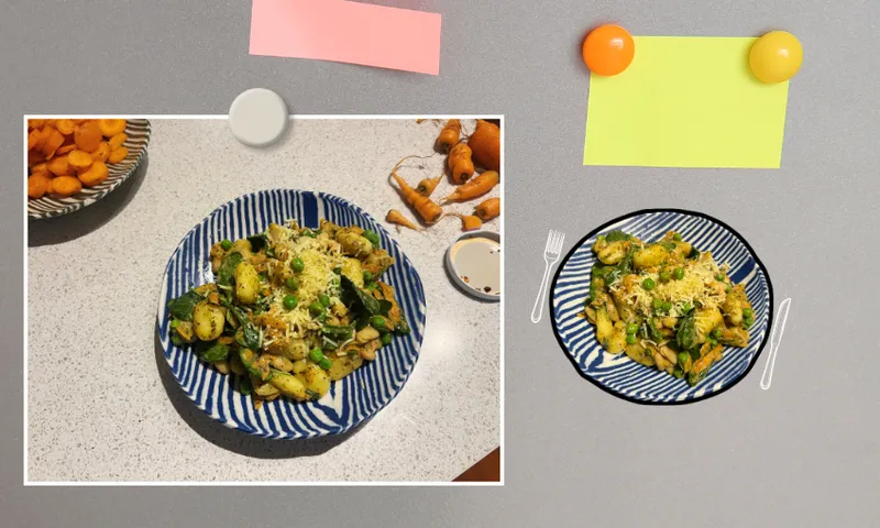 A photo of a blue and white patterned plate with gnocchi, spinach, and cheese is displayed on a countertop. The same dish appears as a cutout pinned to a gray board beside sticky notes and magnets.