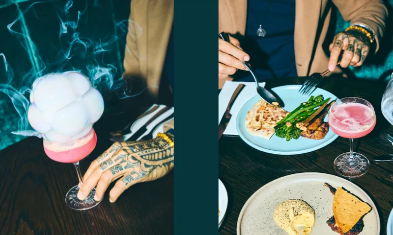 Split image: Left shows a tattooed hand holding a pink cocktail topped with smoke-filled bubbles. Right shows the same hand cutting food on a blue plate, with a pink cocktail, bread, and dessert nearby.