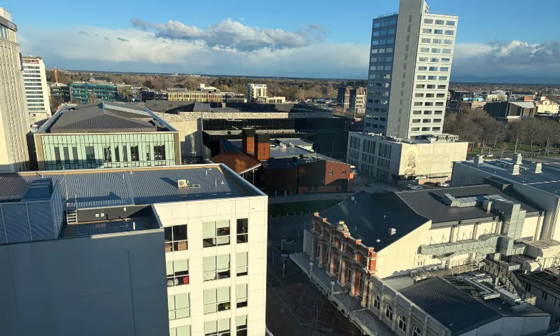 A view over Christchurch city from the 13th floor of Fable. It is a sunny day.