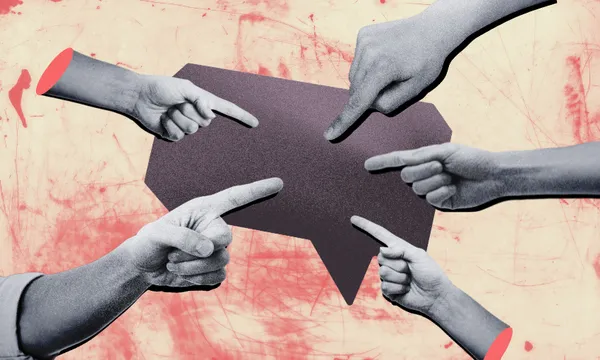 Fingers point at one another