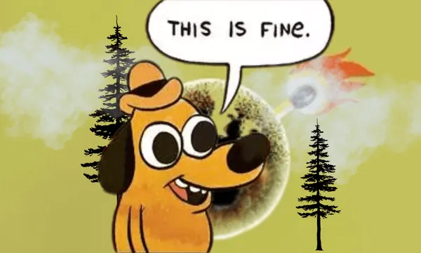 A cartoon dog with a hat says “THIS IS FINE” while a forest fire blazes and smoke billows behind, with a large eye partly visible in the background.