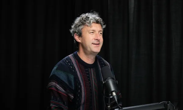 Man in front of microphone