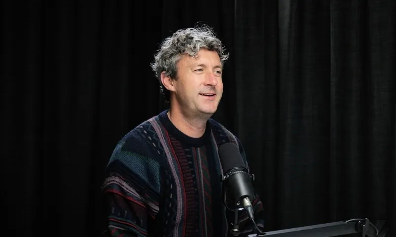 Man in front of microphone