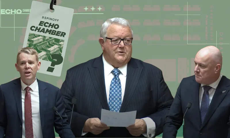 Three men in suits stand at podiums against a green backdrop with graphics and a large tag reading “Echo Chamber” hanging on the left. The central man holds papers and speaks, flanked by the other two facing him.