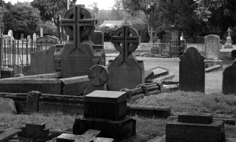 A black and white photo of the Victorian cemetery at Barbadoes Street, Christchurch.