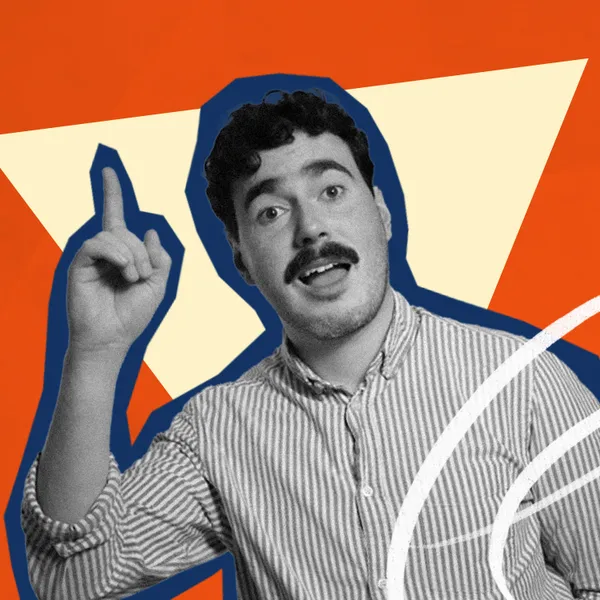 Robbie Nicol, host of Now You Know pointing up with an orange background