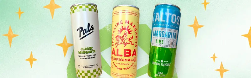 Three colorful canned margarita drinks stand upright against a green, star-patterned background. Each can features different branding and design elements.
