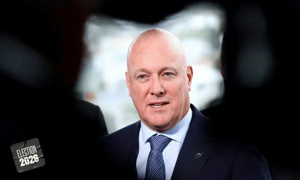 A man looks at the camera