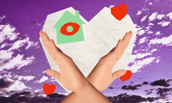 a purple sky background with clouds, a paper heart in the centre and a cutout of hands crossing over each other to signal no