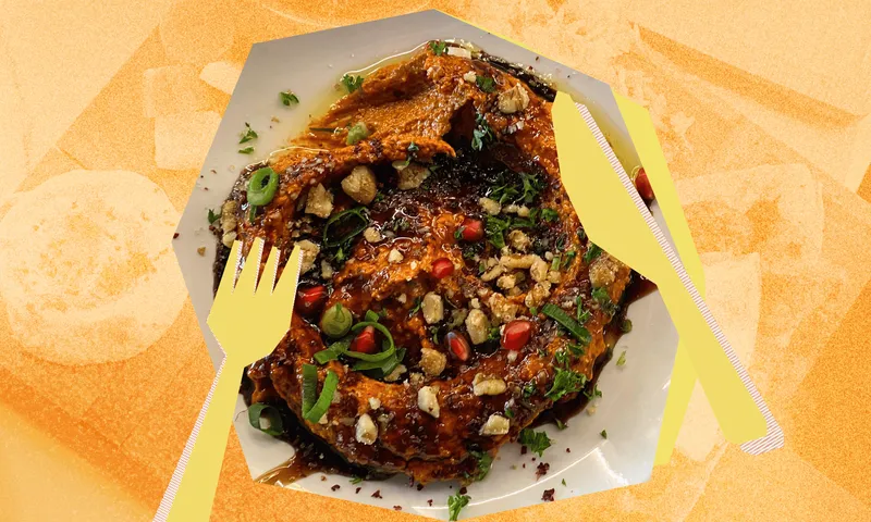 A dip covered in various garnishes against a stylised plate and knife background in orange and yellow shades. 