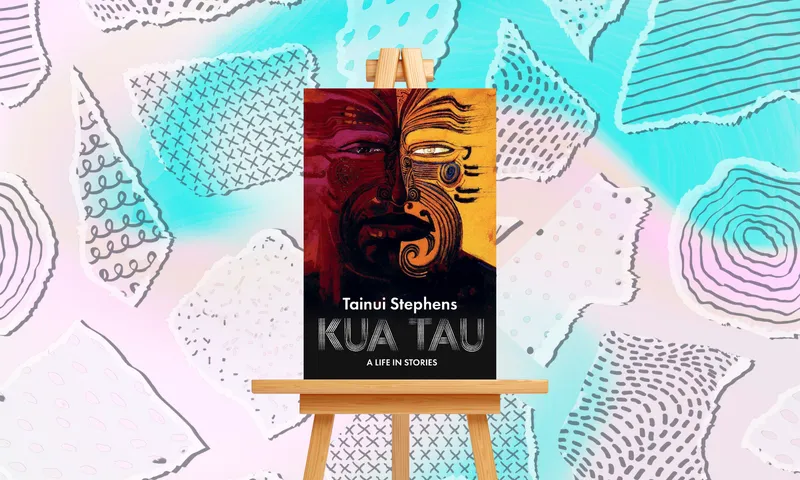 The cover of the book "Kua Tau: A Life in Stories" by Tainui Stephens, resting on a wooden easel against a pastel background of patterned torn paper shapes.   