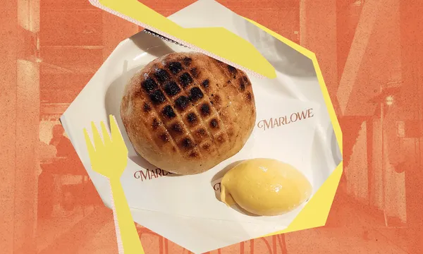 A stylised orange background with a geometric plate and knife and fork image and a bread roll and quenelle of butter. On the plate the word Marlowe is visible