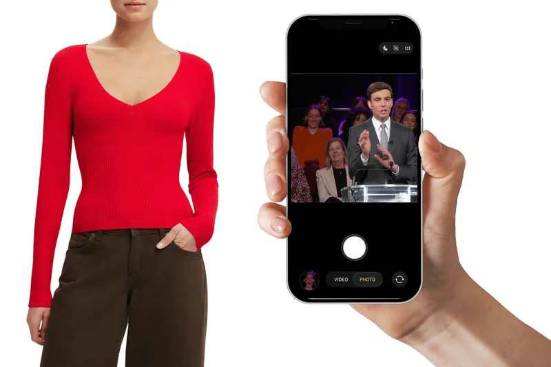A red top and phone with image from the TVNZ debate.