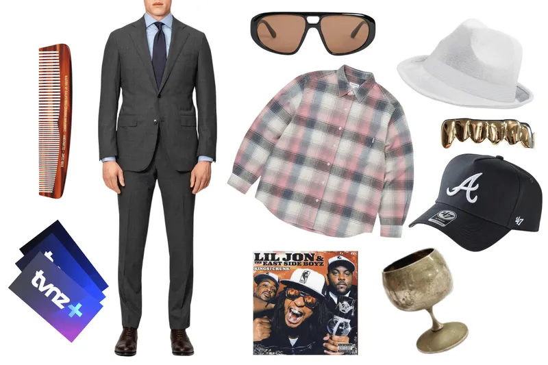 Cue cards, a comb, suit, sunglasses, plaid shirt, hat, grill, cap, goblet and copy of Lil Jon & The East Side Boys album.