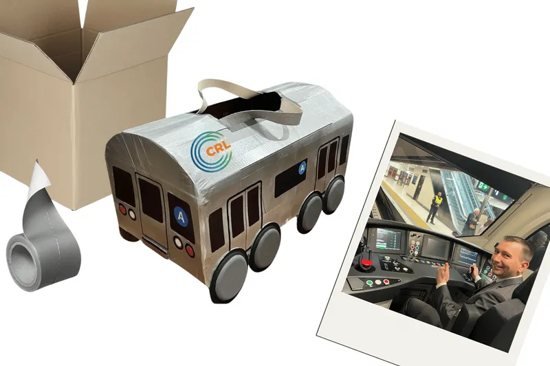 A box, train costume and photo of Simeon Brown.
